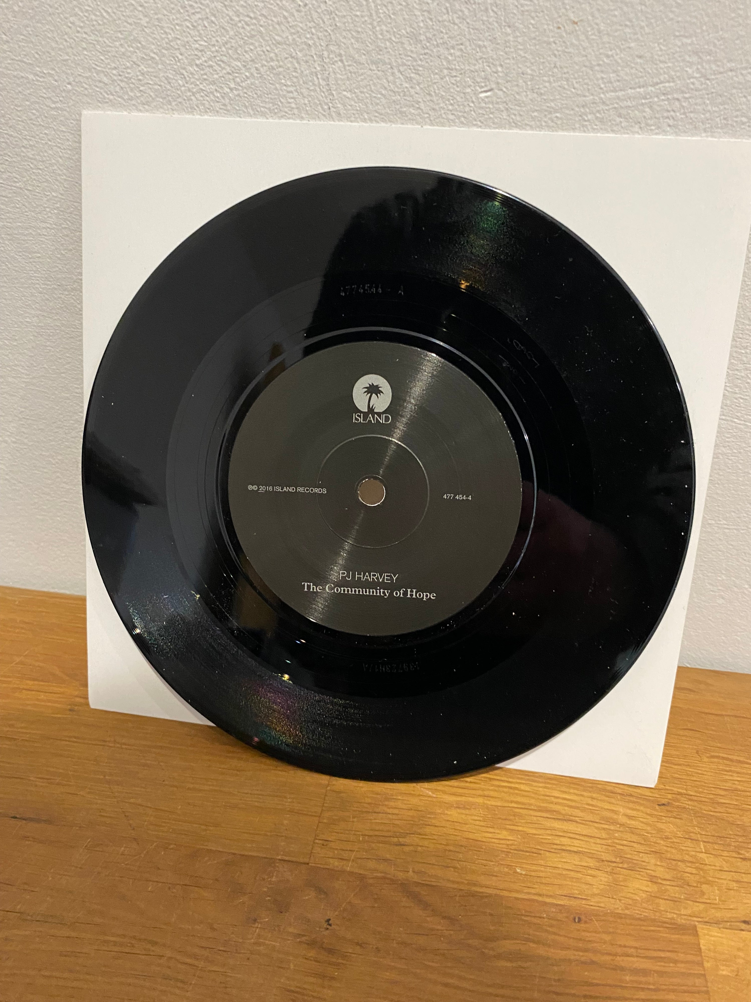 PJ Harvey - The Community of Hope , 7” Etched vinyl