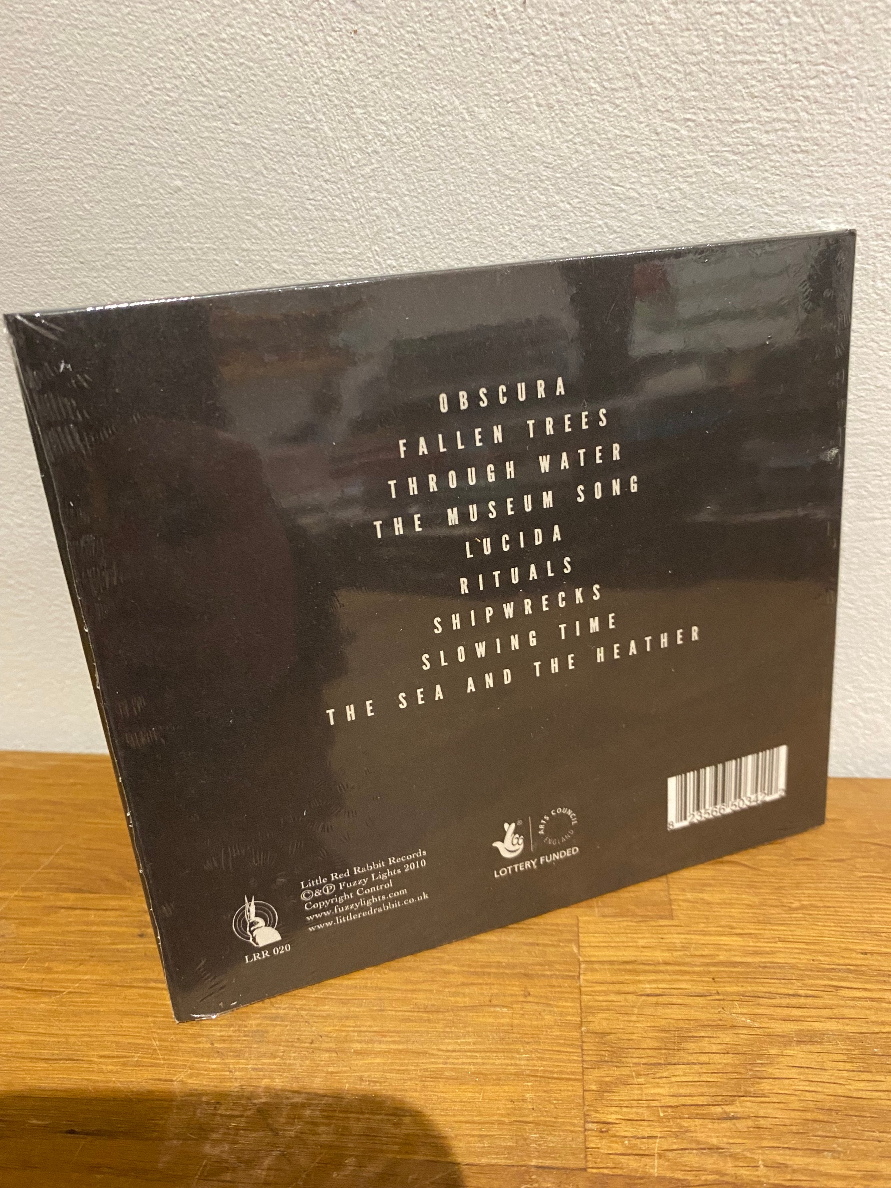 Fuzzy Lights - Twin Feathers , new and sealed cd album.