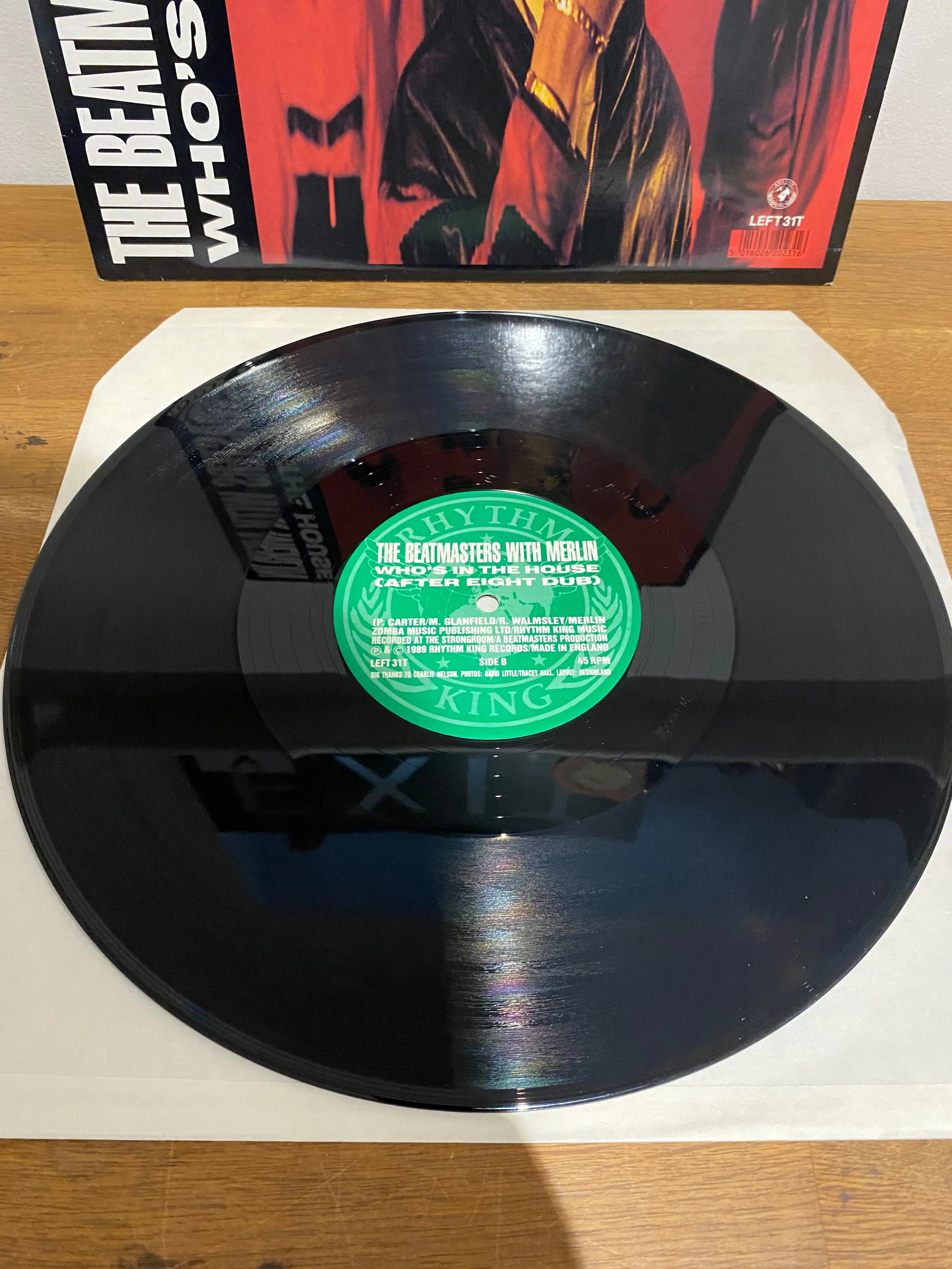 The Beatmasters with Merlin Who’s in the House 12 inch single front and back cover