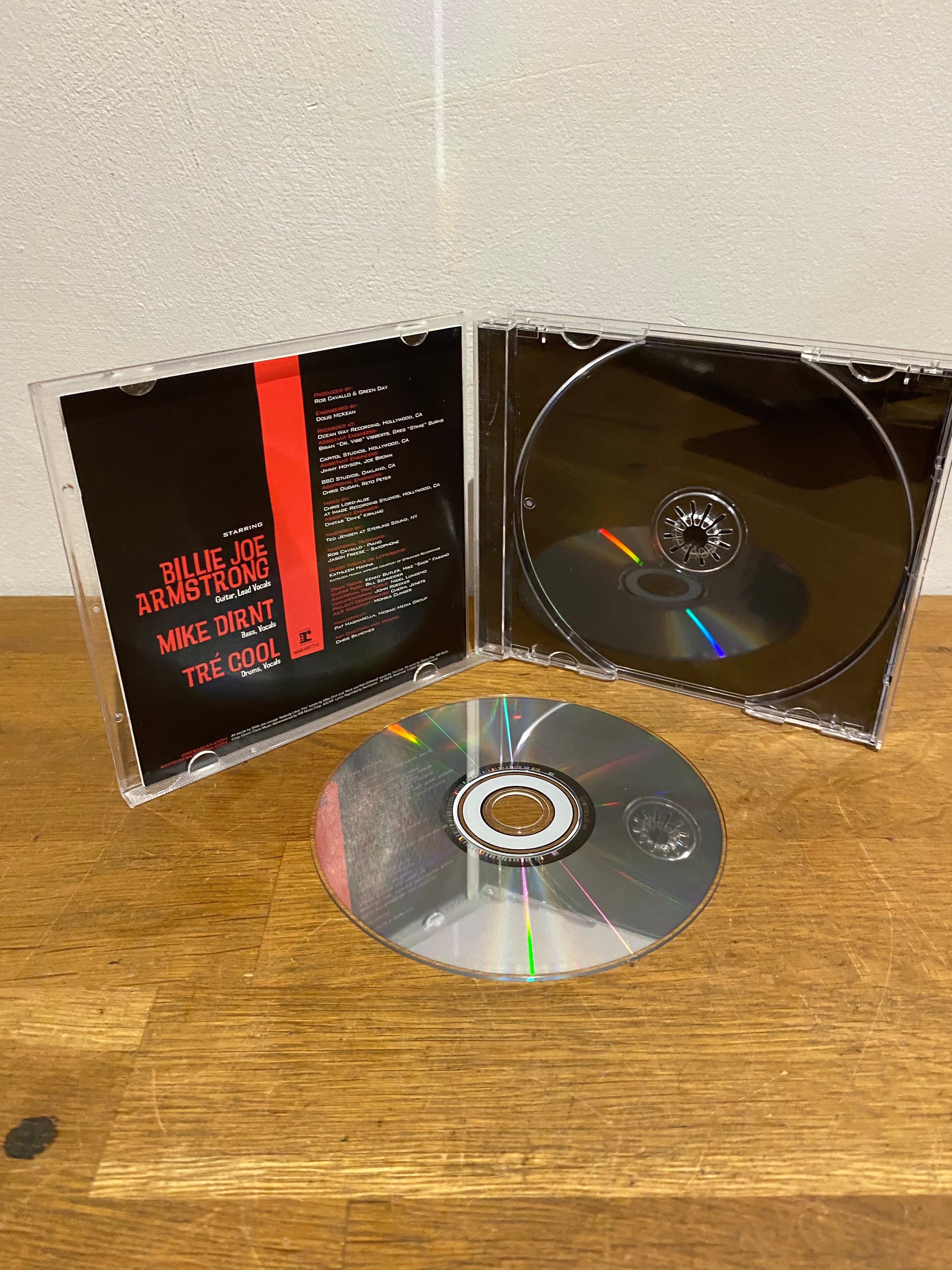 Green Day - American Idiot , cd album, 2004 Reprise records.