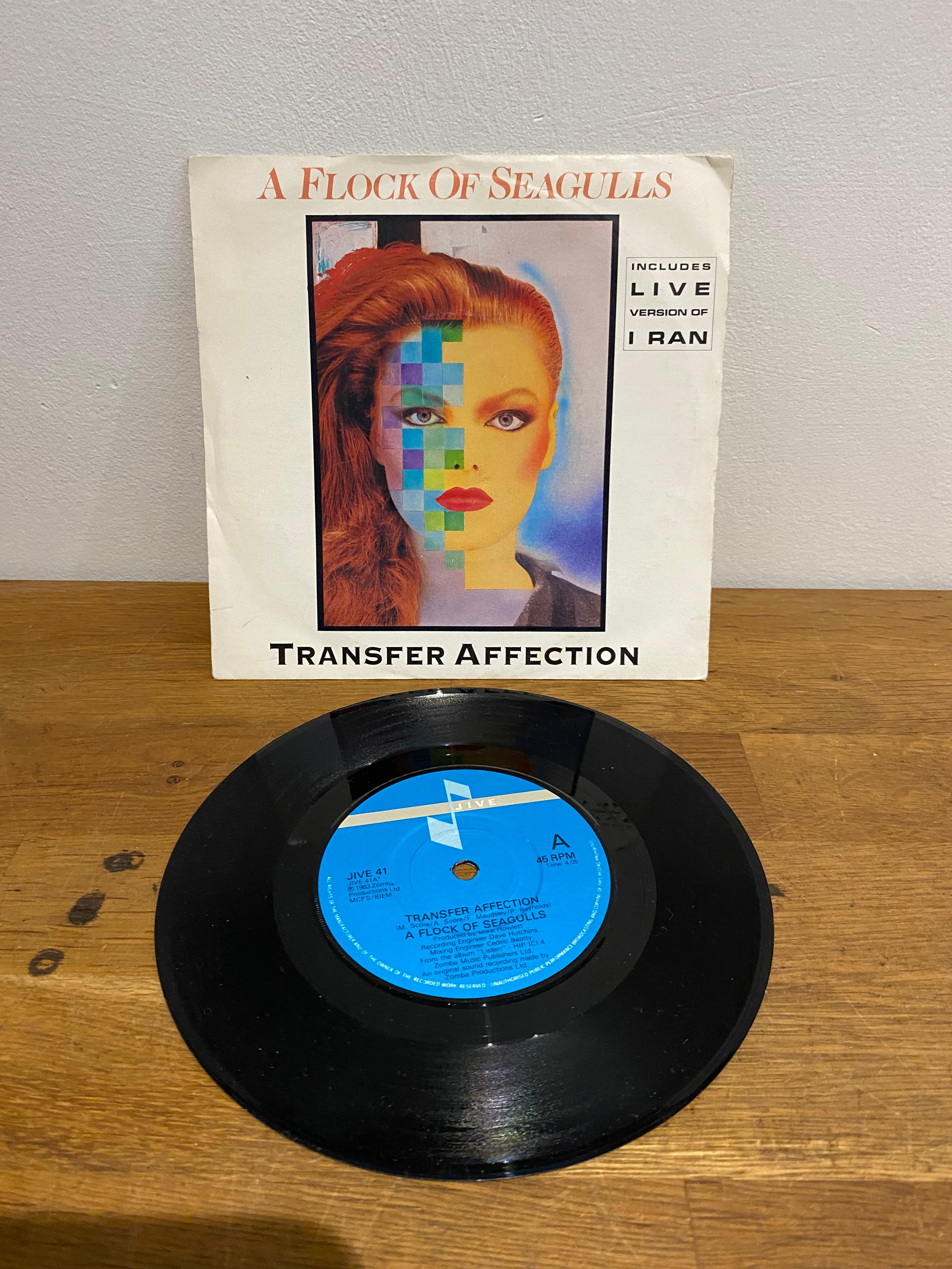 A Flock of Seagulls – Transfer Affection 7-inch vinyl single, 1980s new wave release available at Woody’s Record Store UK.