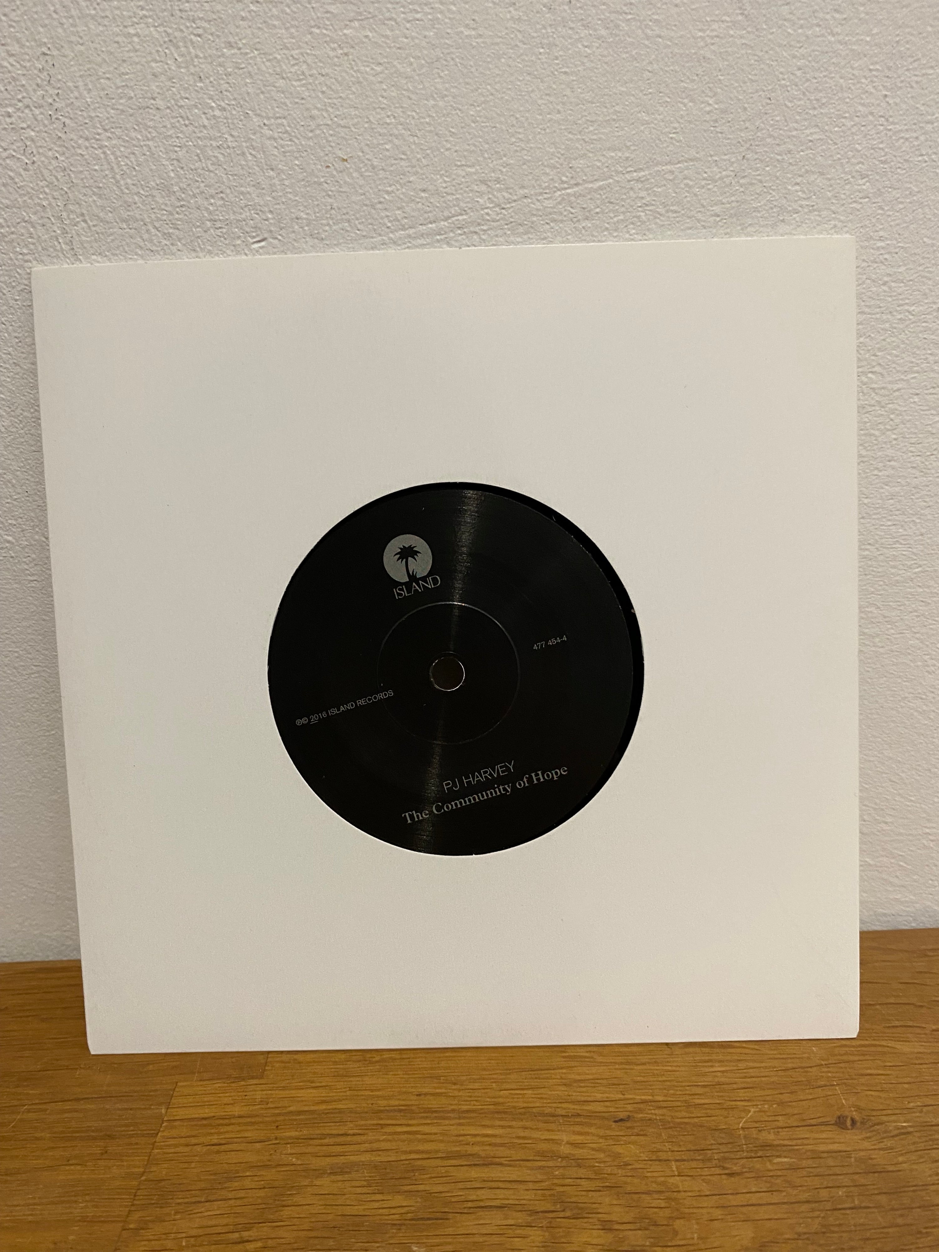 PJ Harvey - The Community of Hope , 7” Etched vinyl