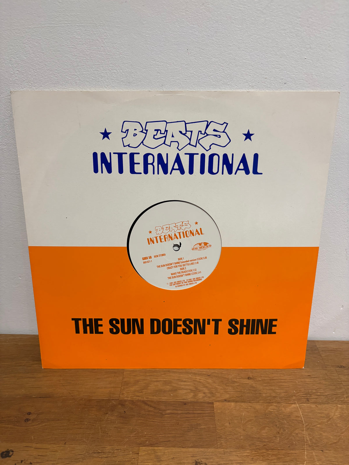 Beats International - The Sun Doesn’t Shine, 12 inch single , 1991 Go! Records.
