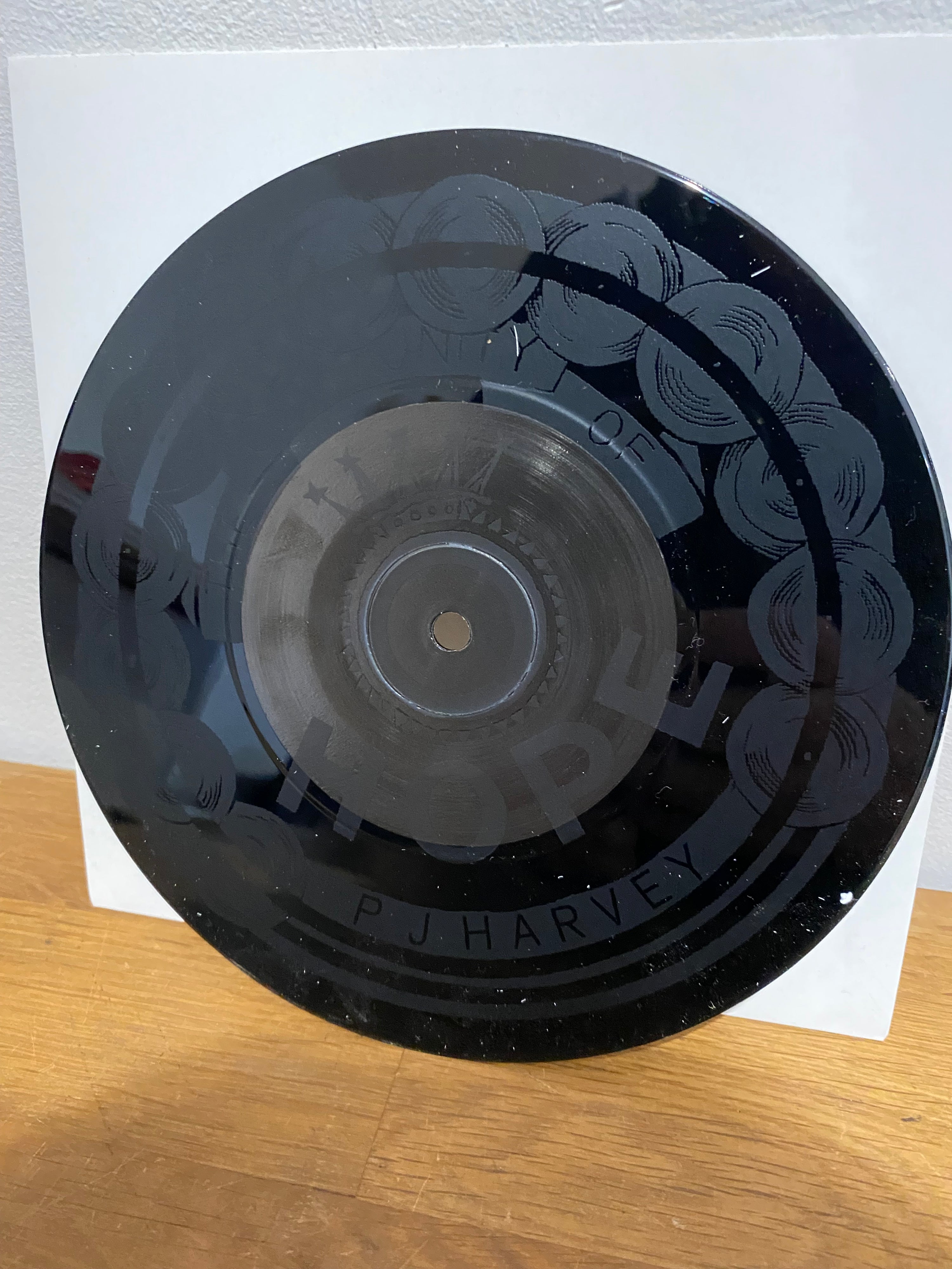 PJ Harvey - The Community of Hope , 7” Etched vinyl