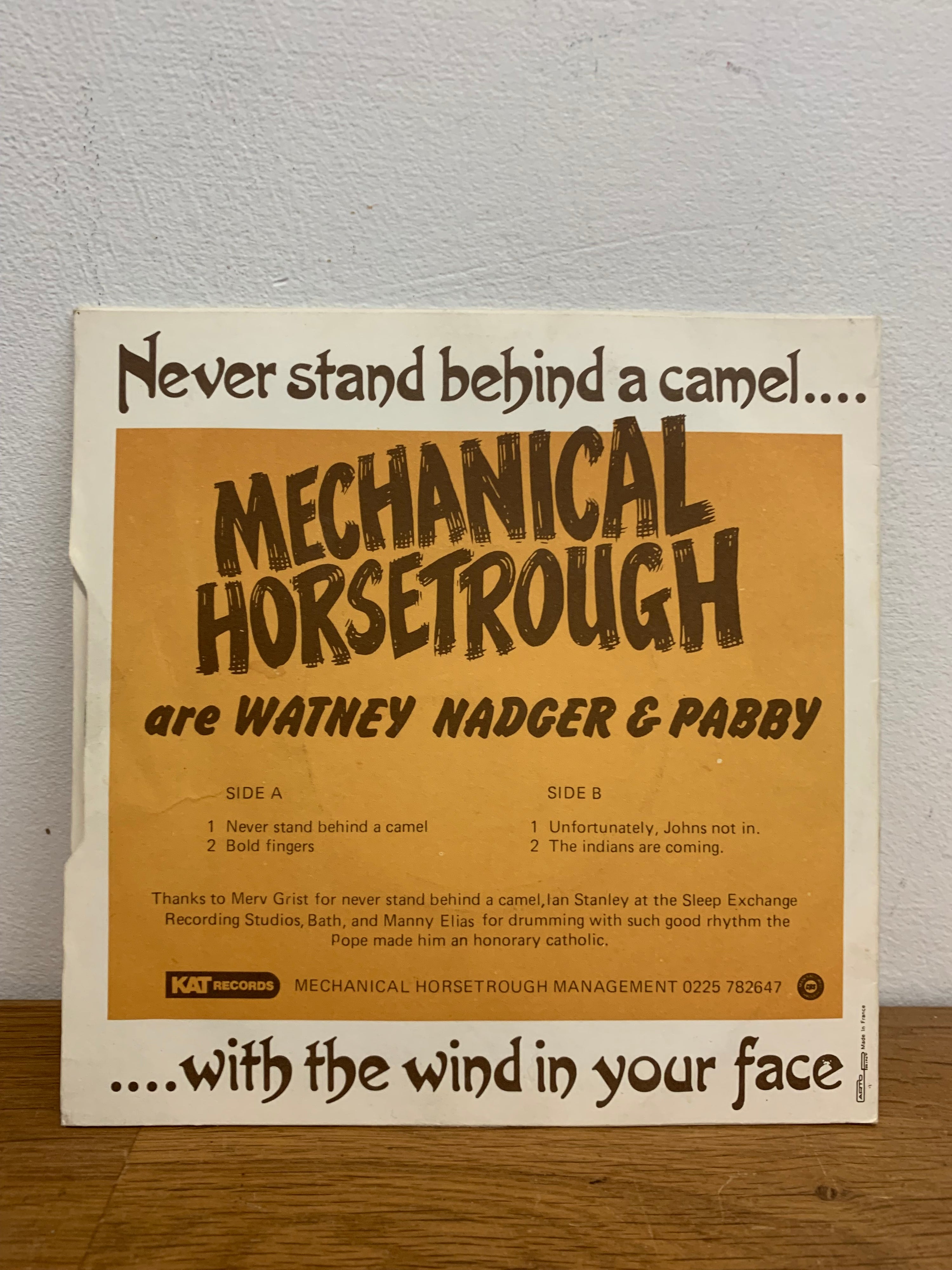 Mechanical Horsetrough - Never stand behind a camel , 7 inch single, KAT records 1982
