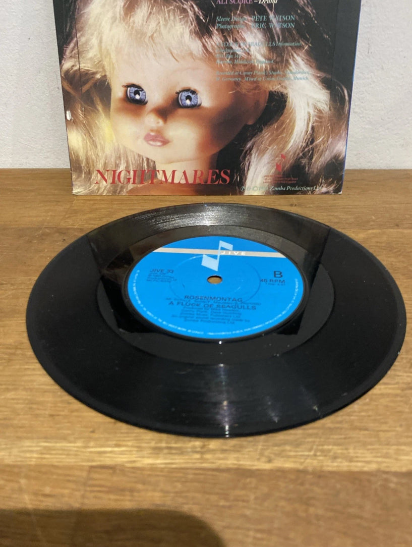 Close-up of A Flock of Seagulls Nightmares 7 inch vinyl disc and cover