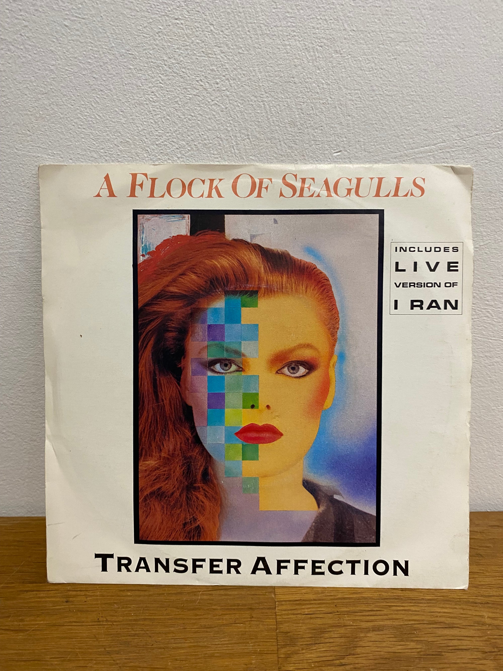 A Flock of Seagulls – Transfer Affection 7-inch vinyl single, 1980s new wave release available at Woody’s Record Store UK.