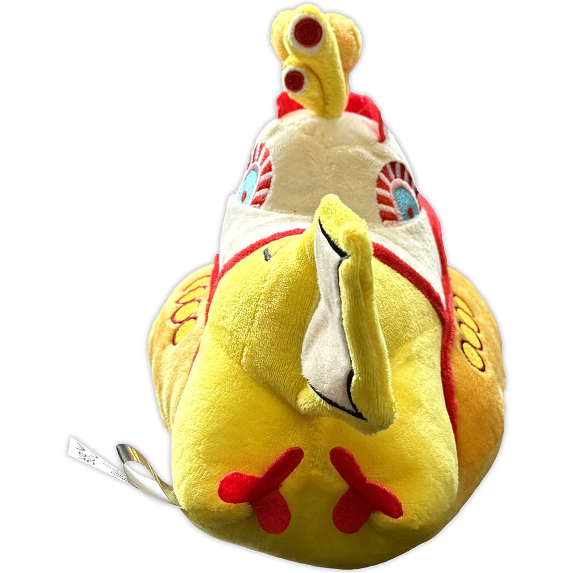 Close-up of Beatles Yellow Submarine plush showing detailed stitching.