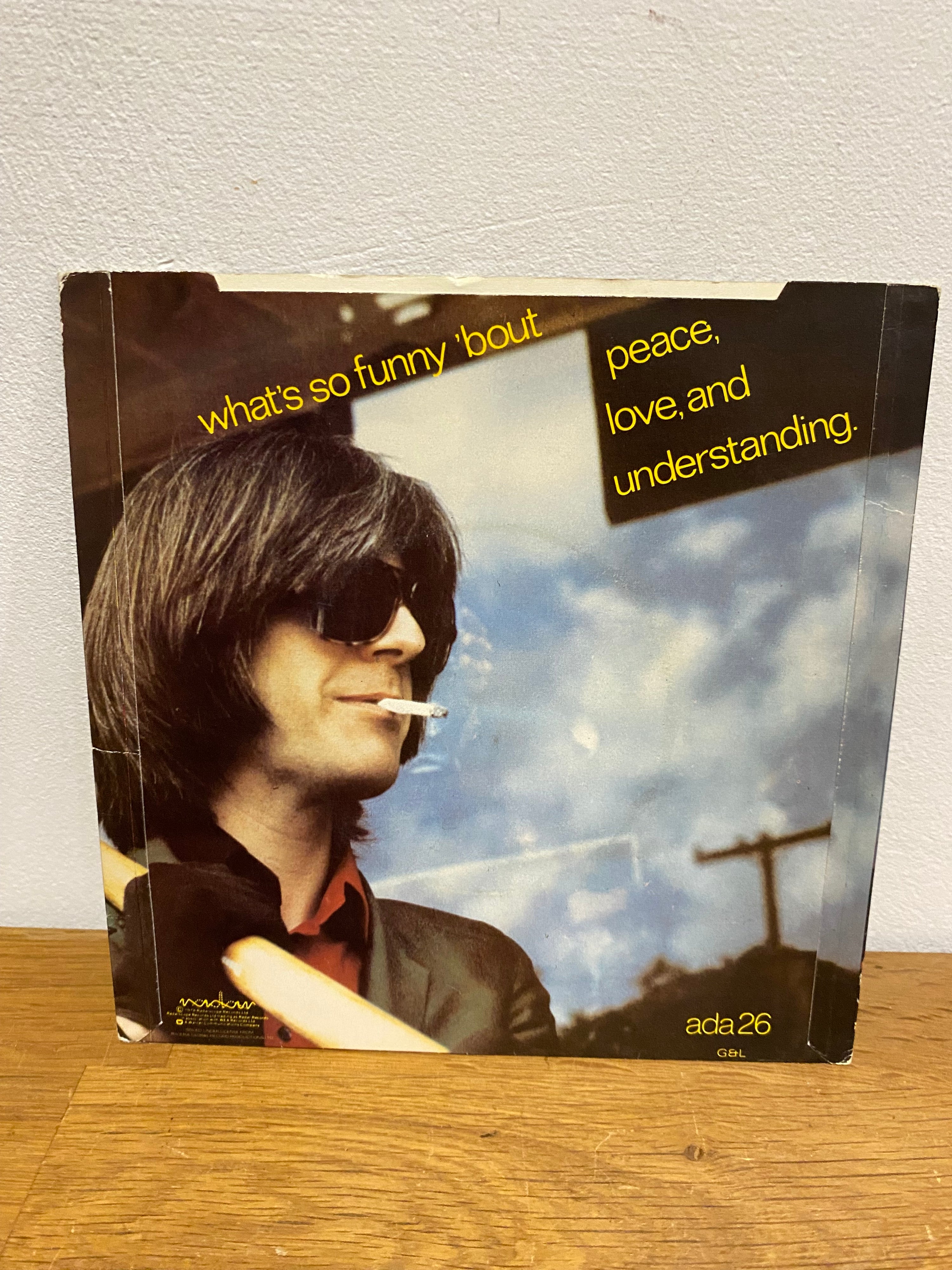 Nick Lowe - American Squirm , 7” single, 7” single , 1978 ADA26