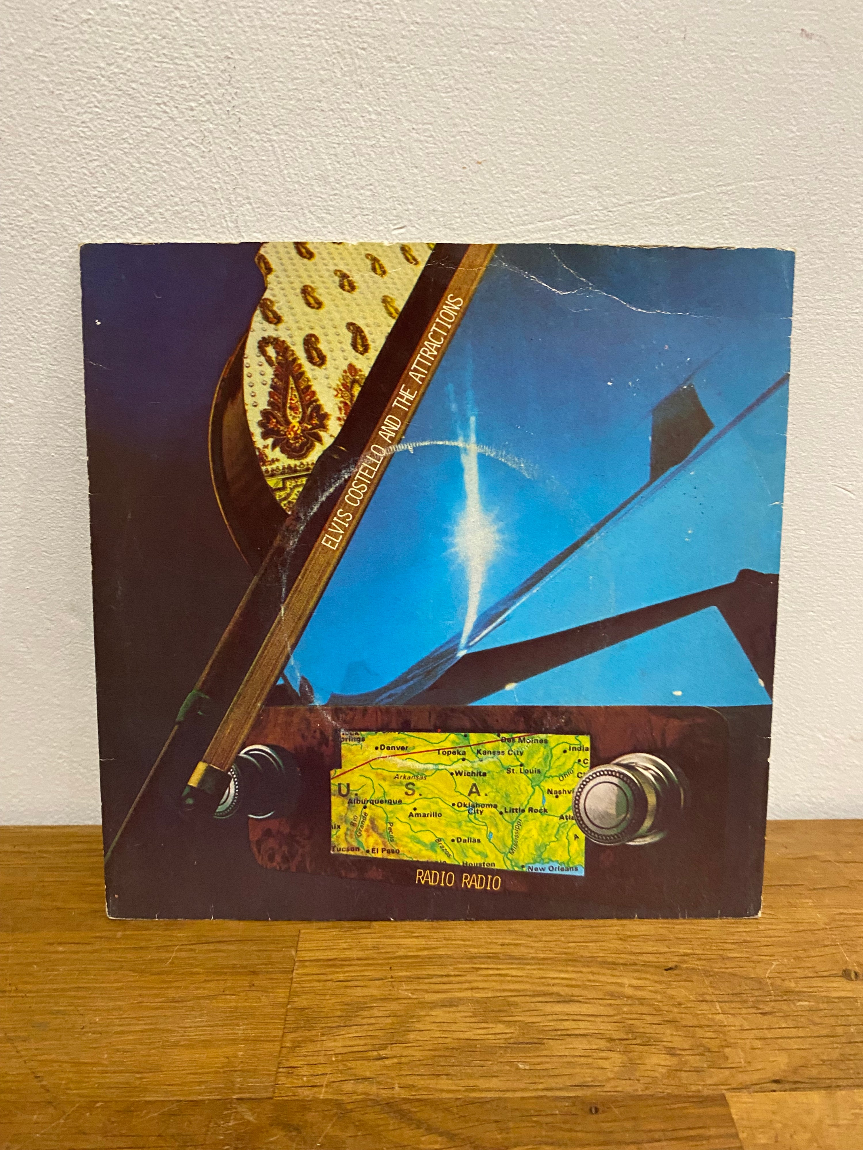 Elvis Costello & The Attractions - Radio Radio , 7” single, 1978 Radarscope records.