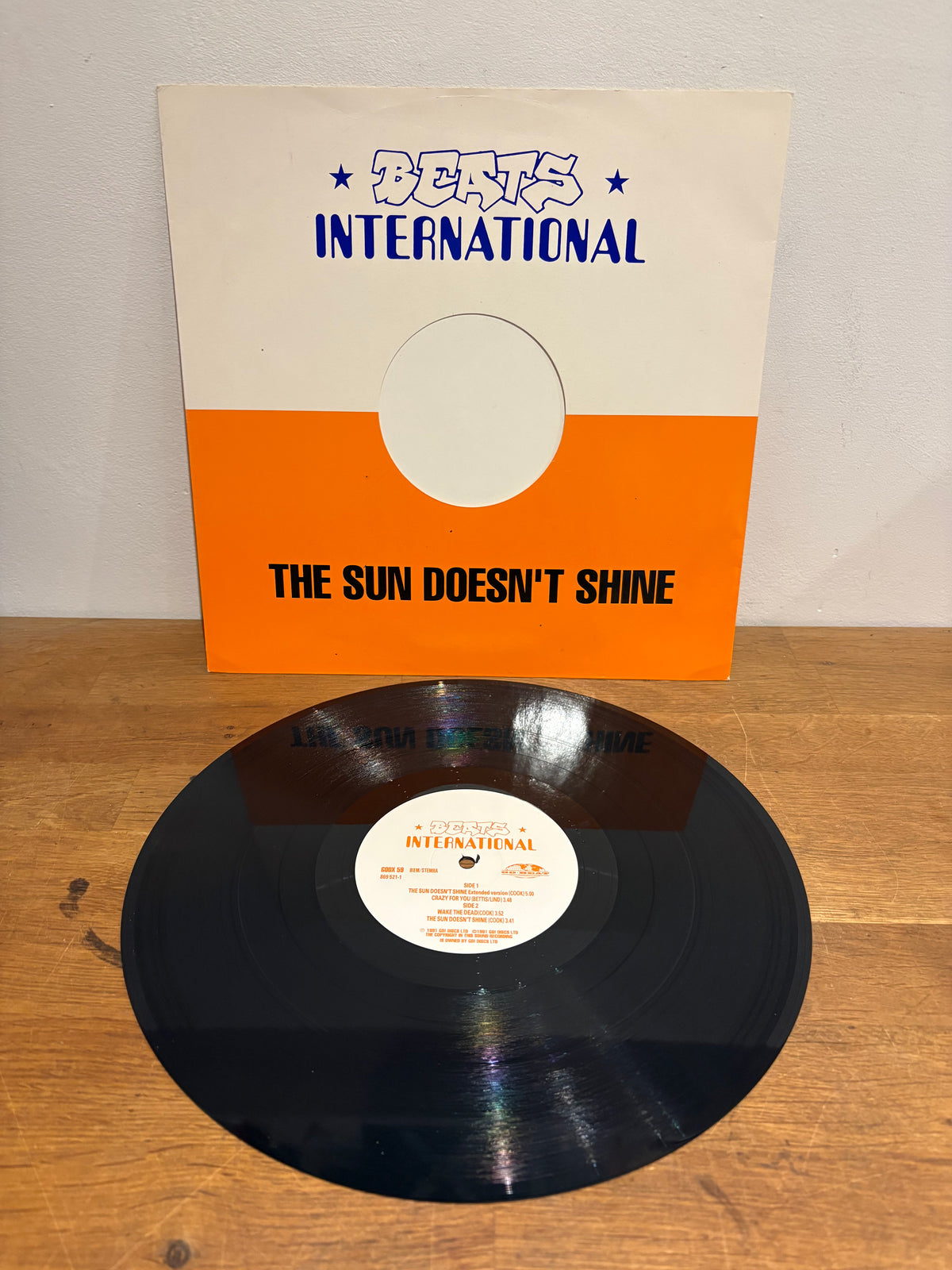 Beats International - The Sun Doesn’t Shine, 12 inch single , 1991 Go! Records.