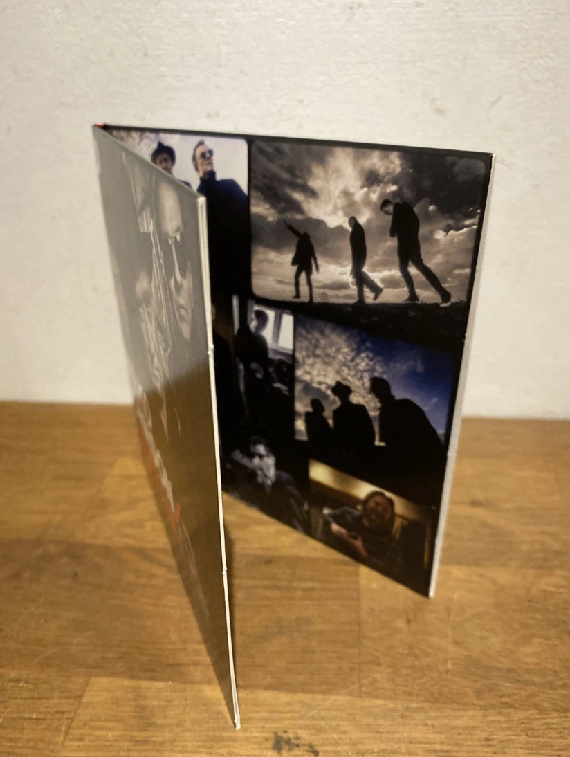 Photos on the band on the inside of Wilko Johnson's CD album cover.