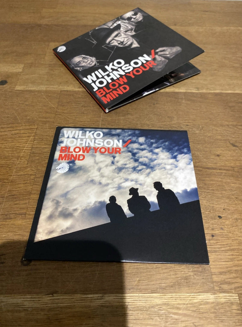 Inside sleeve containing CD by Wilko Johnson.